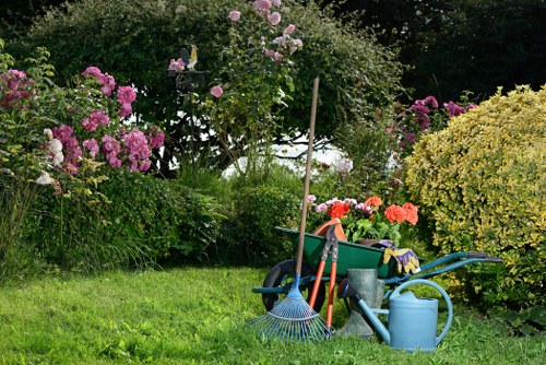 Landscaper laying low-maintenance planting in a Walthamstow yard
